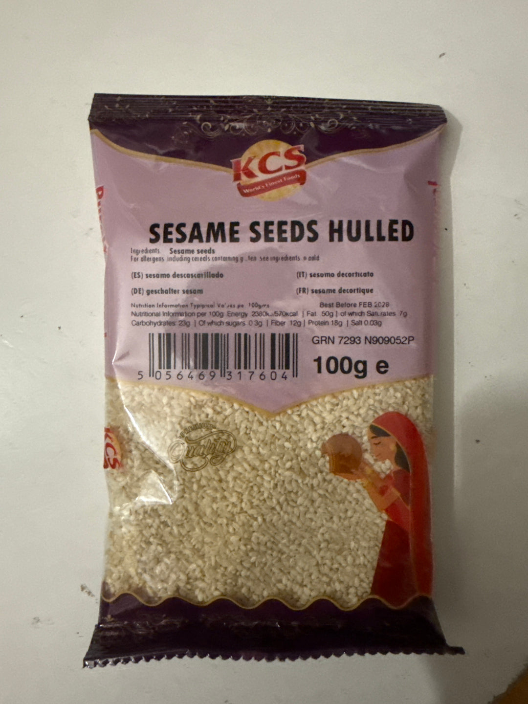 KCS Sesame Seeds Hulled 100g – purple and pink KCS branded clear pouch of white hulled til seeds, high protein sesame for til ladoo, tahini and baking, UK