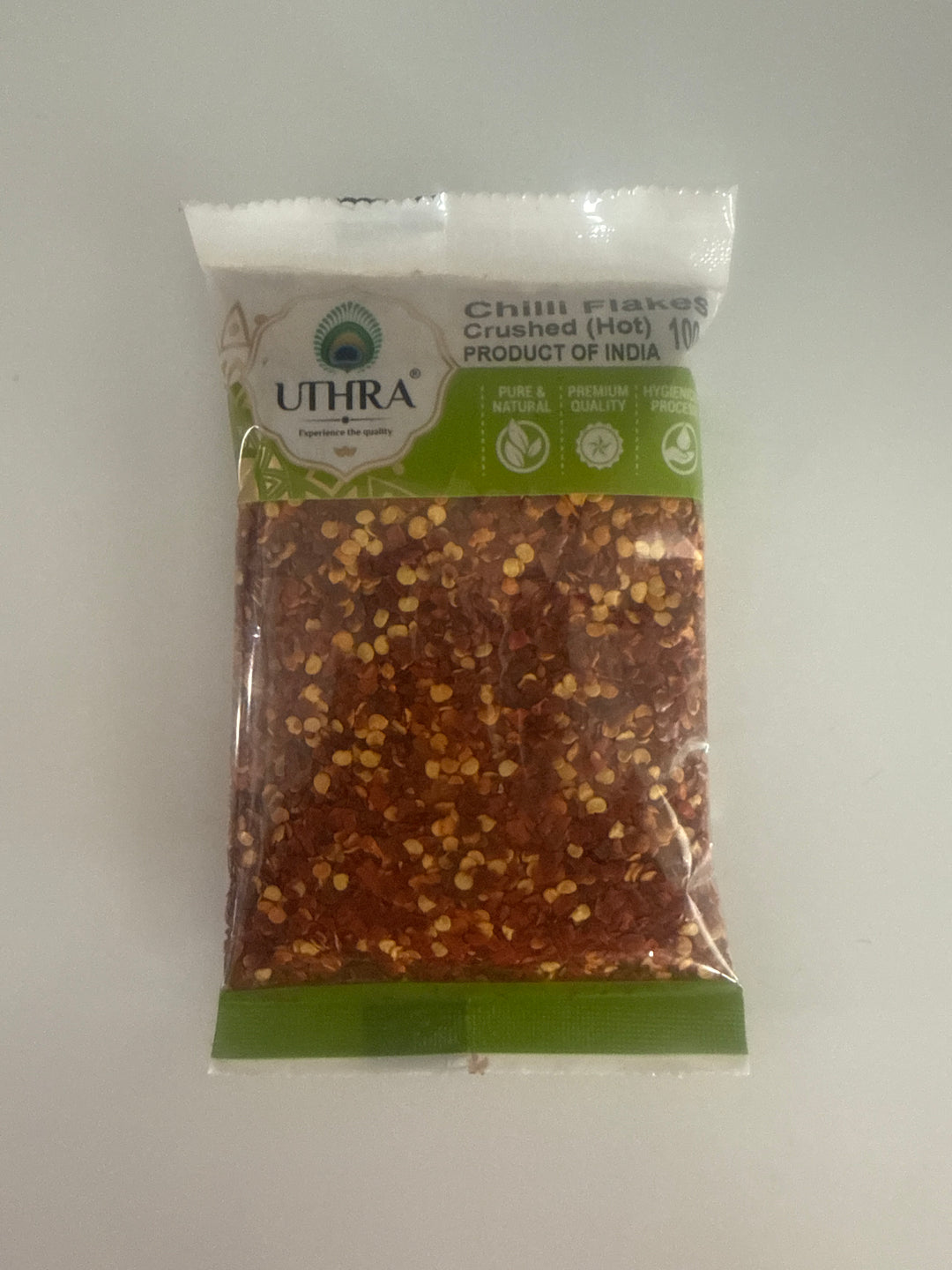 Shop Uthra Crushed Chilli Flakes - 100g at Grocerywala