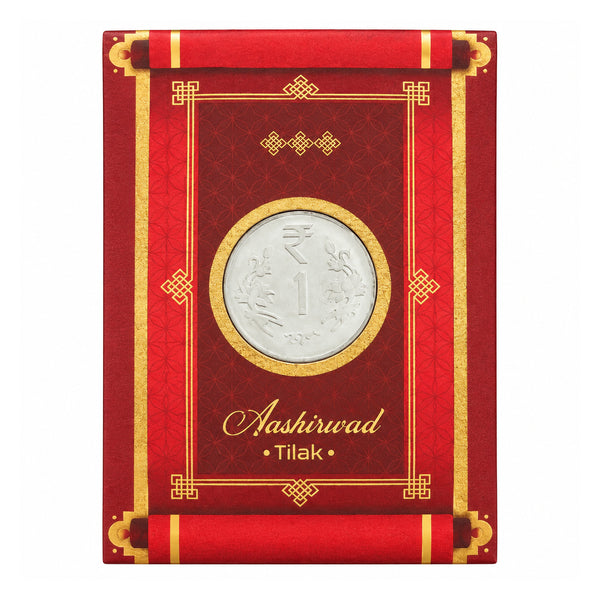 Aashirvaad Tilak red packet with shagun coin on white background