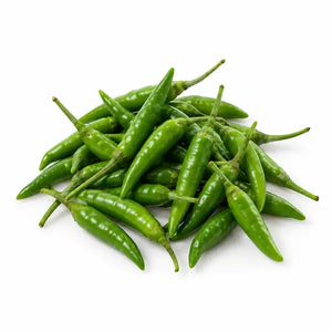 Fresh green bird's eye chillies on a white background