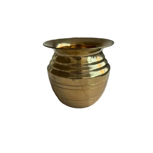 Large brass kalash Indian lota on white background