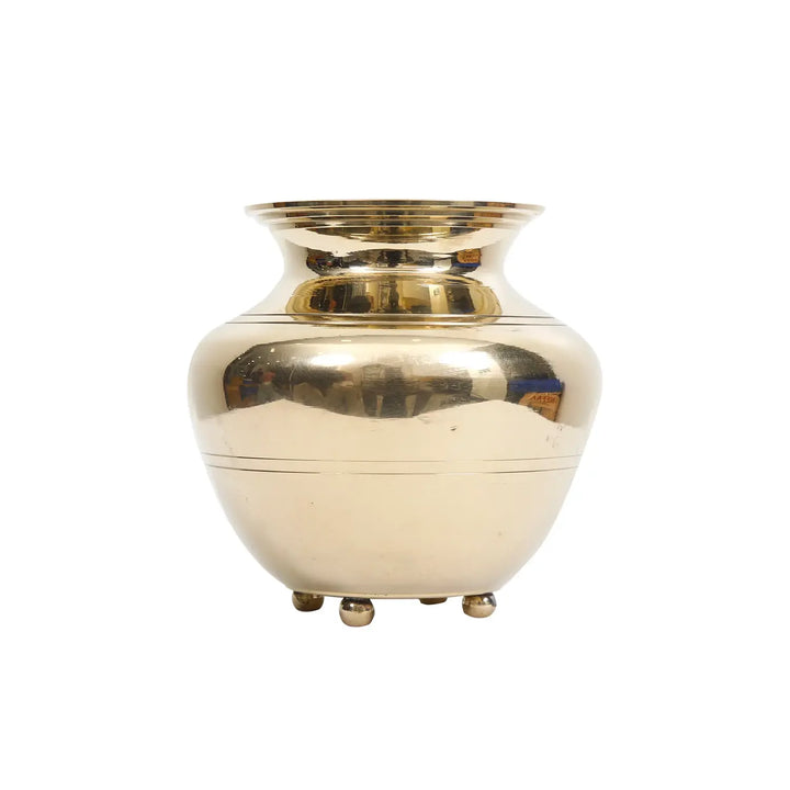 Brass Indian kalash puja lota vessel centred on white background