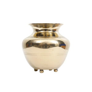 Brass Indian kalash puja lota vessel centred on white background