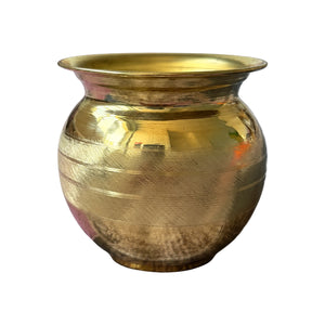 Small brass Kalash Indian pooja lota centred on white background