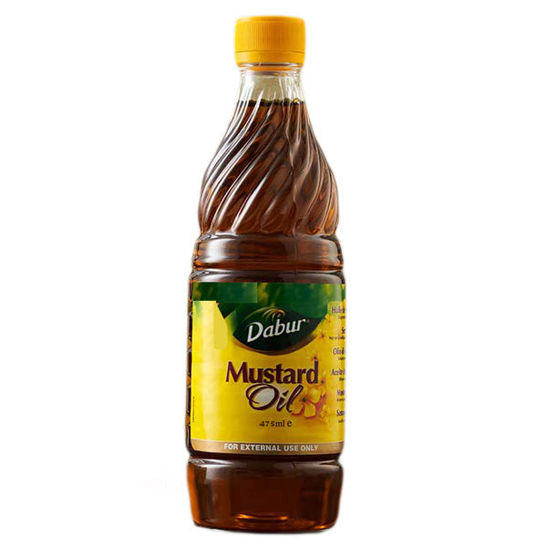 Dabur mustard oil 475ml bottle, labelled for external use only