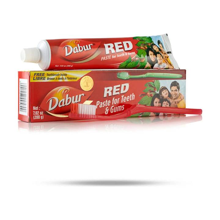 Dabur Red Toothpaste free brush inside 200g pack shown front-facing on white background