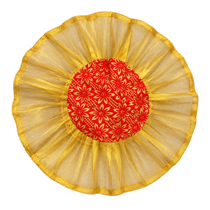 Red and gold decorative thali cover or dry fruit potli on white background