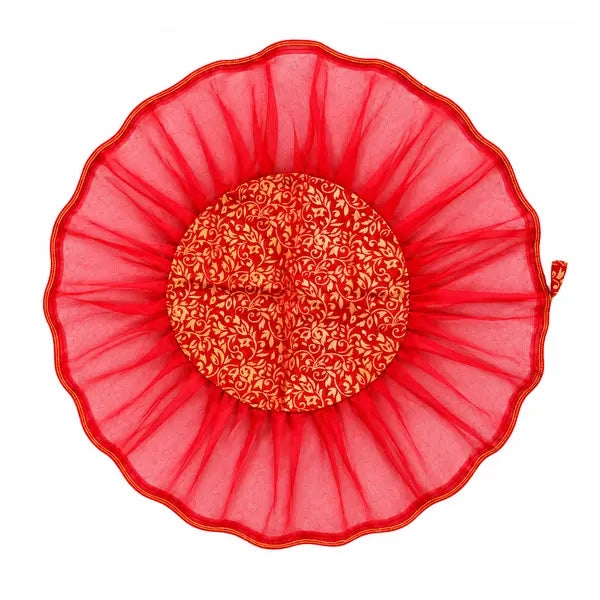 Decorative red thali cover and dry fruit potli on white background