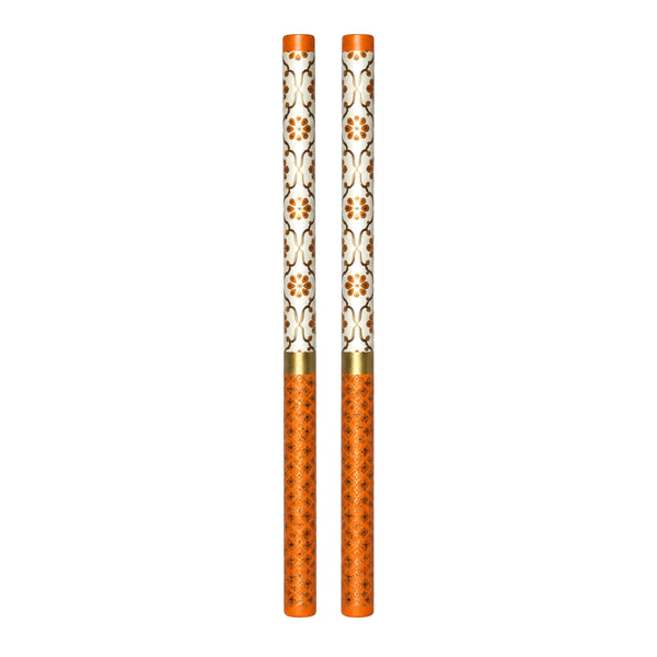Orange and white designer Dandiya sticks, one set of two on white background