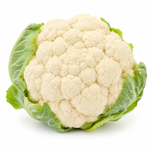 Fresh large cauliflower with green leaves on white background