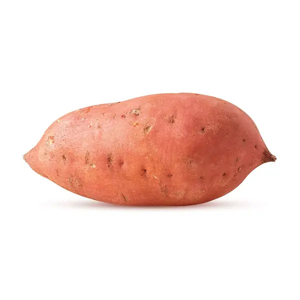 Fresh whole red sweet potato on a white background