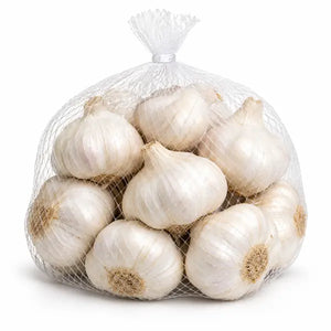 Large pre-pack of fresh garlic bulbs on a white background