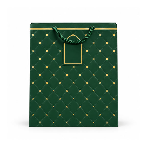 Green and gold floral gift bag with rope handles on white background
