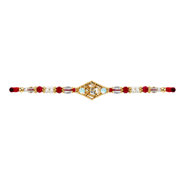 Kanak Deep Rakhi with gold motif and red white beads on white background