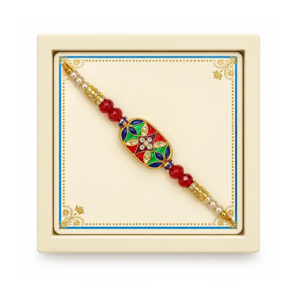 Kundan Rakhi with multicolour centre and beads in presentation box on white background