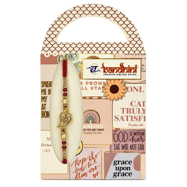 Om Bandhan Rakhi with gold centre charm on decorative gift card