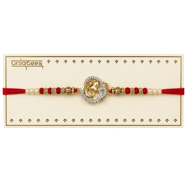OmGanesh Rakhi with red thread on cream presentation card