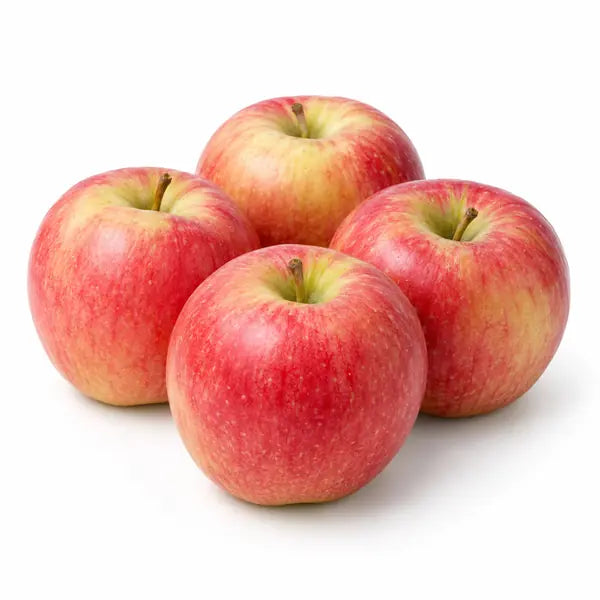 Fresh Pink Lady apples on a white background