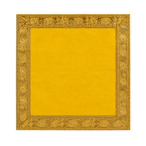 Yellow Pooja velvet cloth with ornate gold border on white background