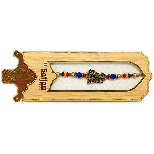 PremDhara Rakhi with multicolour beads in gold presentation tray
