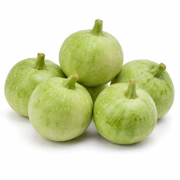 Fresh tinda Indian round gourds on a white background