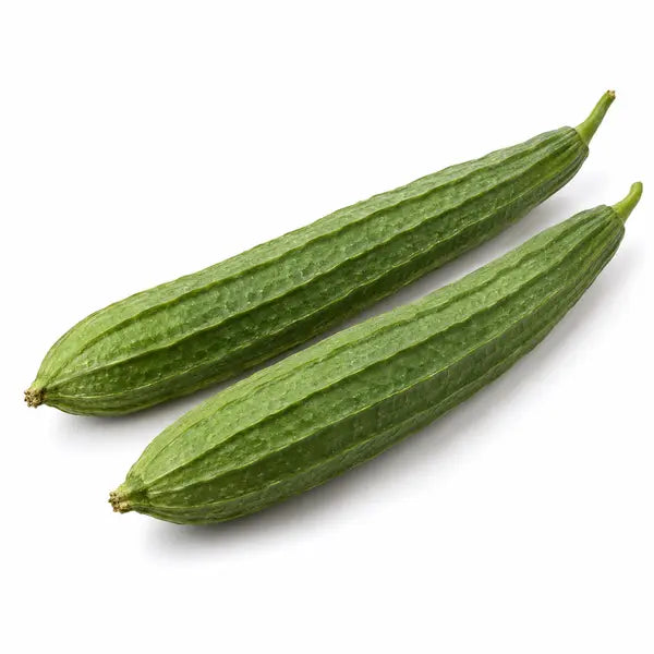 Fresh turia ridge gourds on a white background