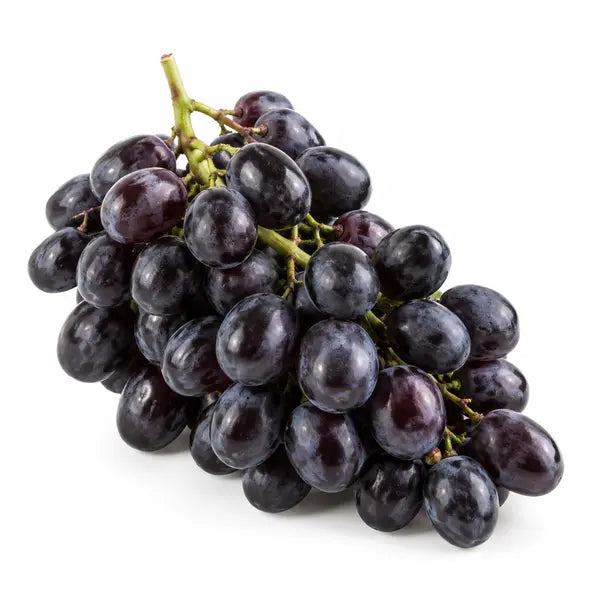 Fresh black grapes on a white background