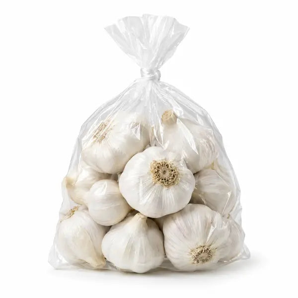 Medium pre-pack of fresh garlic bulbs on a white background