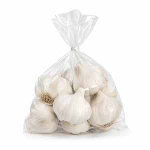 Small pre-pack of fresh garlic bulbs on a white background