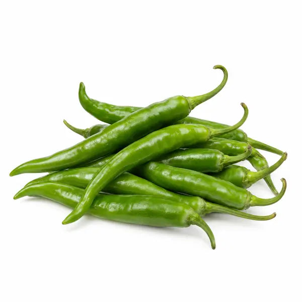 Fresh mild green chillies on a white background