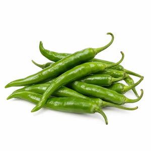 Fresh mild green chillies on a white background