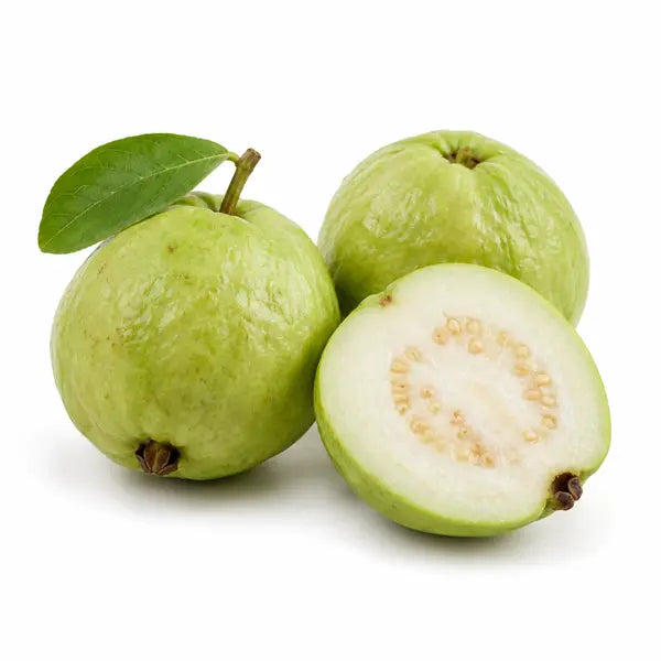 Fresh Indian guavas on a white background