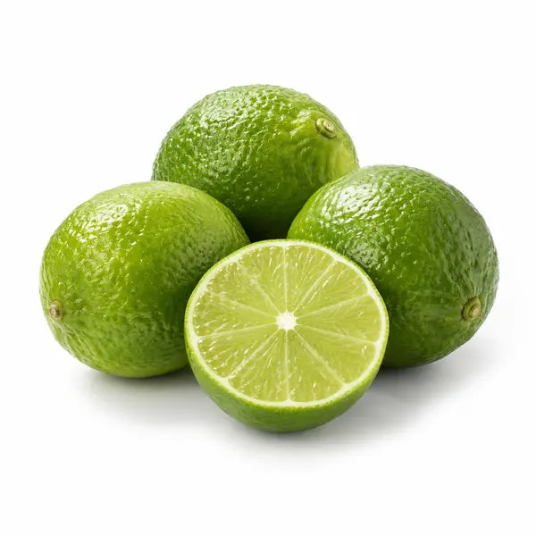 Fresh green limes on a white background