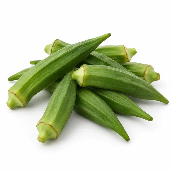 Fresh green okra pods on a white background