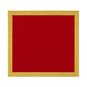 Plain red velvet pooja cloth with decorative gold border on white background