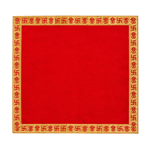 Red Pooja velvet cloth with gold Swastik and Kalash design on white background