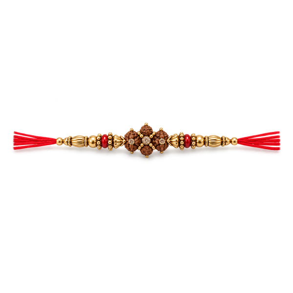 Royal Rudraksha Rakhi with antique-gold beads on white background