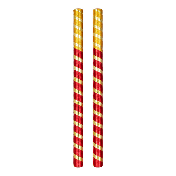Red and gold shiny Dandiya sticks, one set of two on white background