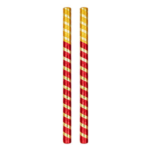 Red and gold shiny Dandiya sticks, one set of two on white background