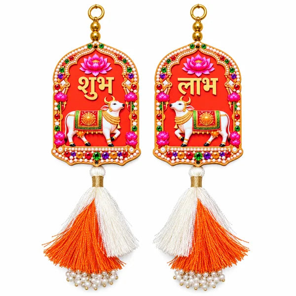 Shubh Labh cow hanging pair with lotus motifs, orange and white tassels and pearl-style bead loops